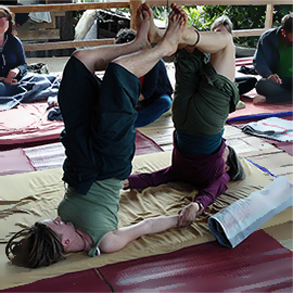 Couple during an acroyoga exercise