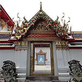 an open temple door in which you can see an open temple door